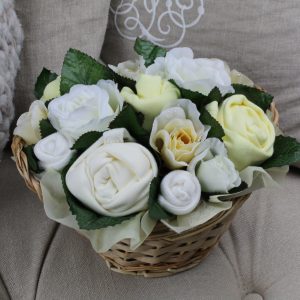 Deluxe Bouquet Lemon - basket full of baby clothes rolled to look like flowers