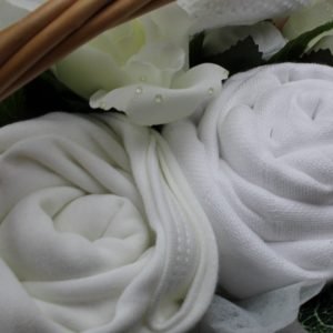 New Baby Gift - Wicker basket with Numerous Baby Clothing Items Included