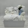 Westerdale – Giftware Boxes – A magnificent box filled with everything you need at bathtime. A beautiful soft hooded towel to wrap baby after using world renowned Johnsons Baby Bath with its coveted smell. A set of soft clothes from vest to hat and a soft hair brush and comb set. A lovely white Comforter and a clip on dummy chain to help finish bathtime.