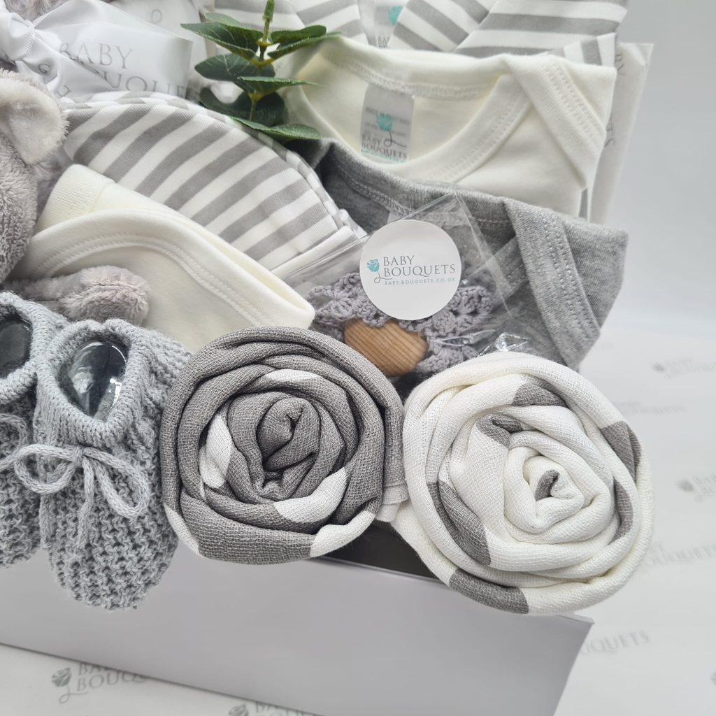 Torver - Gift box of baby clothes in grey & white colour - rolled to look like flowers