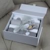 Grey Muslins Gift Box - A smart white box packed with 4 muslins and a hand crochet dummy chain finished with a hand tied ribbon bow.