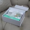Mint Muslins Gift Box – A smart white box packed with 4 muslins and a hand crochet dummy chain finished with a hand tied ribbon bow.