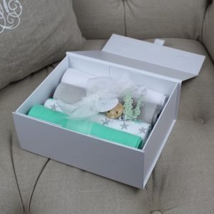Mint Muslins Gift Box – A smart white box packed with 4 muslins and a hand crochet dummy chain finished with a hand tied ribbon bow.
