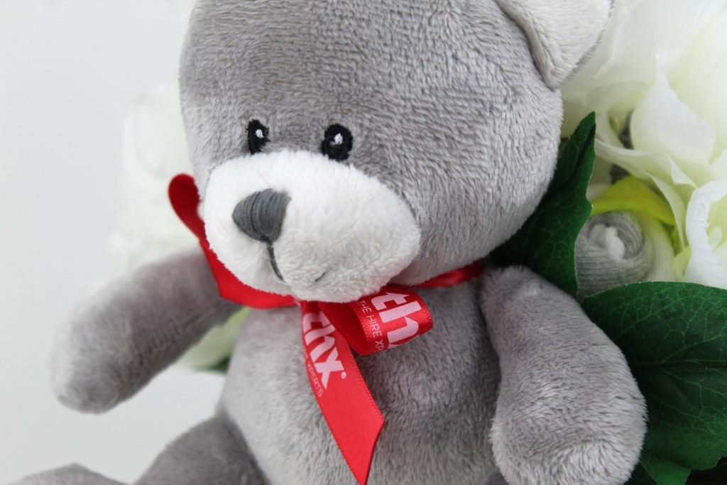 gender neutral baby bouquet grey teddy with branded ribbon
