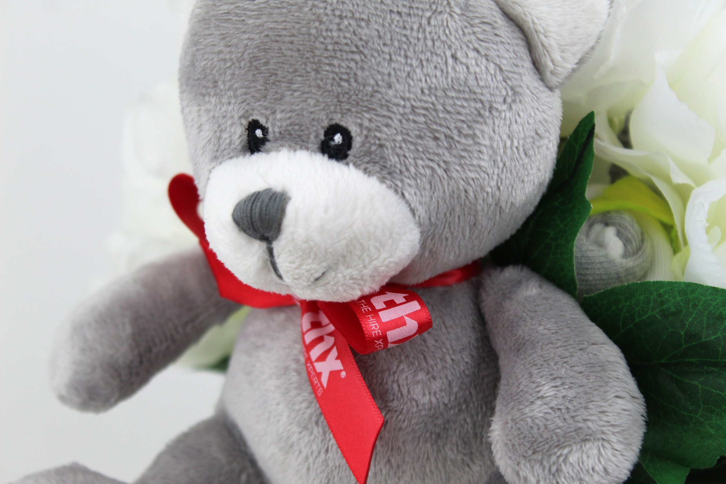 gender neutral baby bouquet grey teddy with branded ribbon