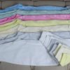 Baby sleepsuits in various colours and sizes
