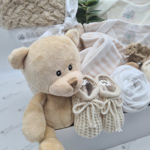 Torver In beige - a baby gift box packed full of baby essentials including a super soft teddy bear.