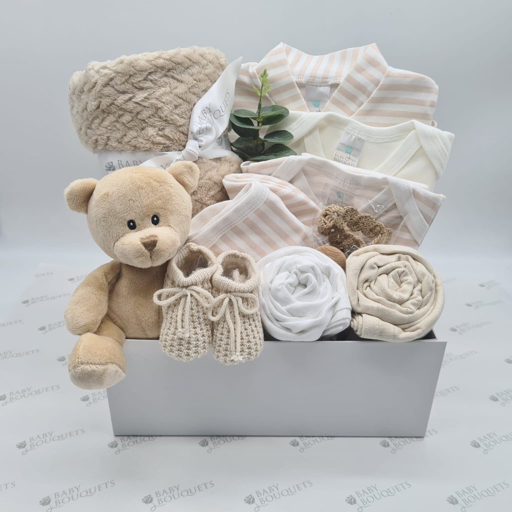 Torver In beige - a baby gift box packed full of baby essentials including a super soft teddy.