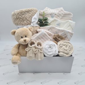 Torver In beige - a baby gift box packed full of baby essentials including a super soft teddy.