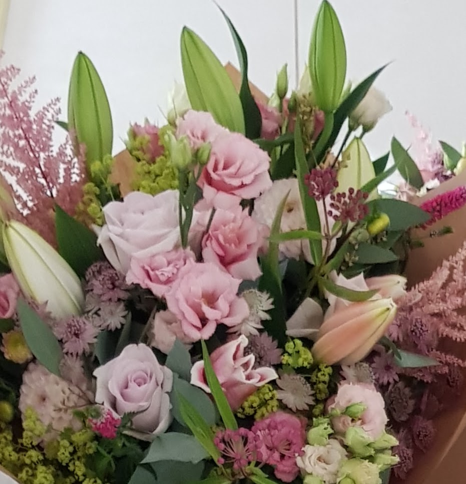 baby clothes bouquet styled like a bouquet and flowers gift